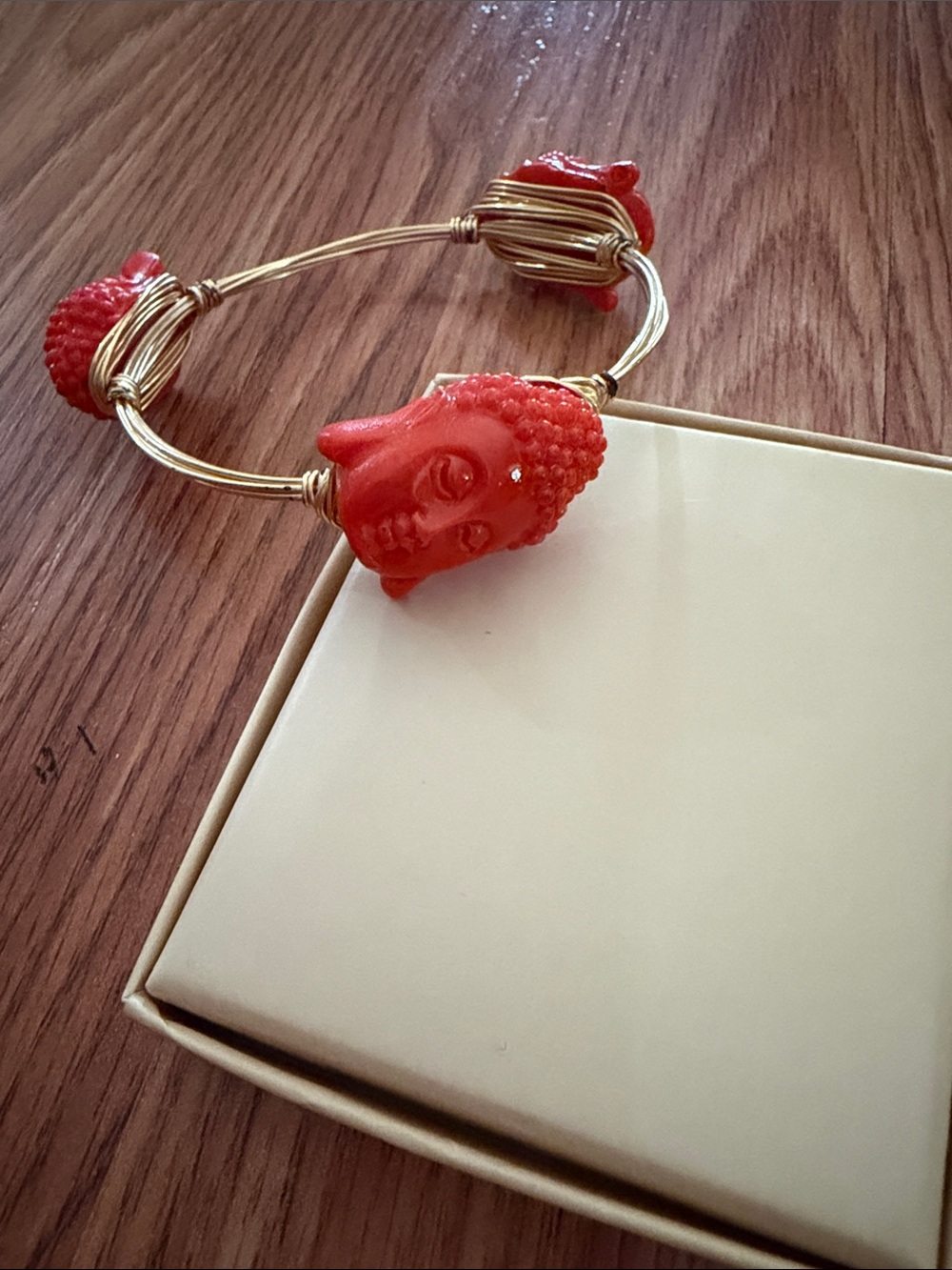 Orange Buddha Head/ Wire Bangle Bracelet